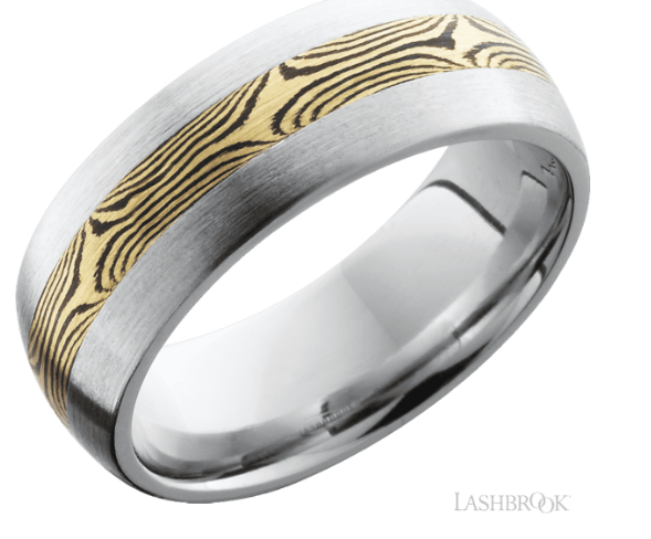 Cobalt chrome 8mm domed band with one inlay that is 3mm wide of the mokume that is made from  14k y