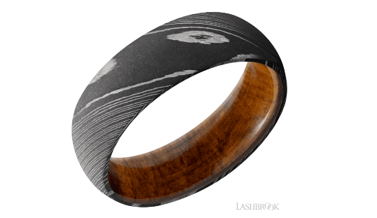 damascus-steel-7mm-domed-band-with-a-hardwood-inside-sleeve.-acid/-desertironwood