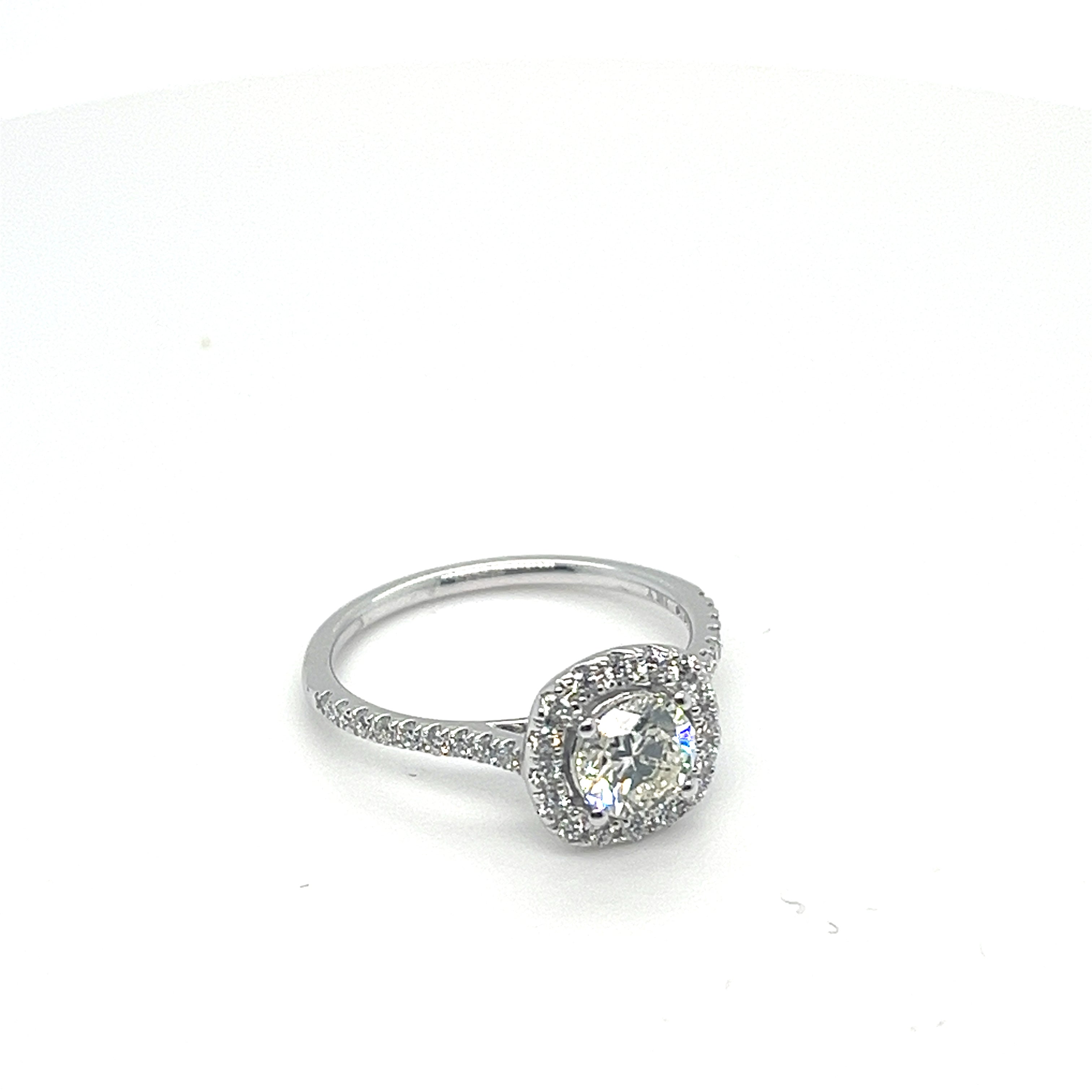 0.74 CT BR H SI1 NCT /14KWG BR 0.30CT DIA CUSHION HALO ENG RING